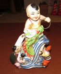 Chinese Boy, Foo Dog, Fish, and Man Porcelain