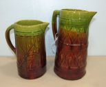 Two Brown and Green Graduated Glaze Stoneware Pitchers
