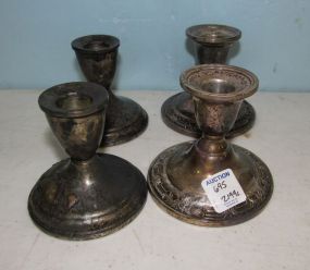 Four Weighted Sterling Candleholders