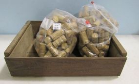 Wine wood box and bags of corks