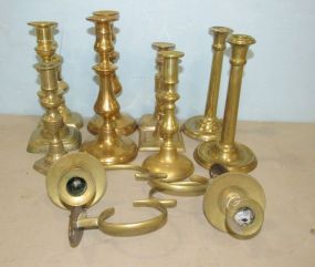 Twelve Brass Candleholders and Candle Sconce