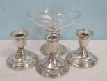 Three Weighted Sterling Candle Holders and Sterling Compote