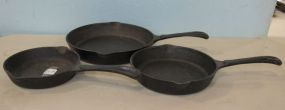 Three Cast Iron Handled Pans