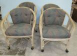 Four Wicker Club Chairs