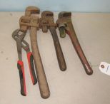Three Pipe Wrenches and Vise Grip