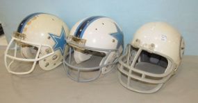 Three Vintage Football Helmets