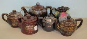 Six Brown Ceramic Tea Pots