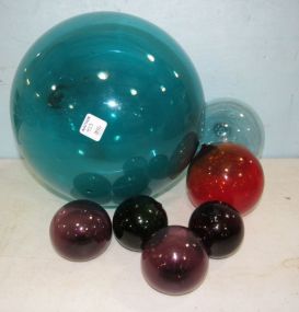 Seven Assorted Sized Hand Blown Glass Balls