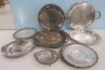 Nine Pieces of Silver Plate Plates