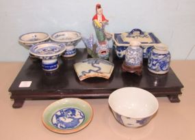 Group of Chinese Pottery Pieces and Wood Display Stand