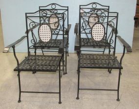 Four Wrought Iron Fold Up Chairs