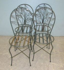 Four Wrought Iron Chairs