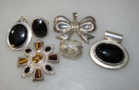 Five Sterling Rings and Pendents