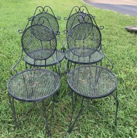 Four Wrought Iron Patio Chairs