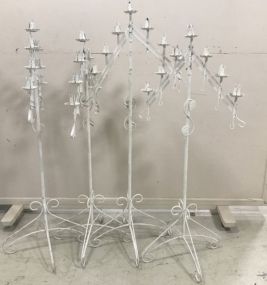 Four Wrought Iron Candle Stands