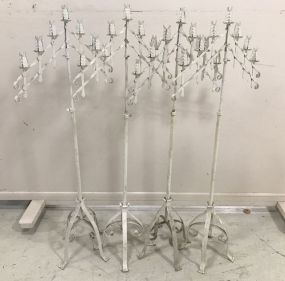 Four White Painted Wrought Iron Candle Stand