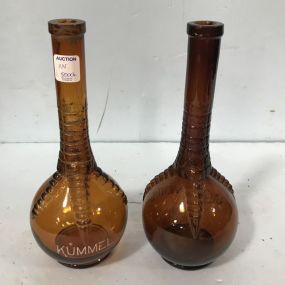 Pair of Amber Claw Spirit's Bottles
