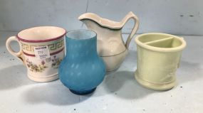 Four Collectible Porcelain Cups