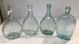 Four Collectible Glass Bottles