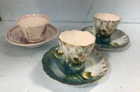 Pair of Prussia Cups, Saucers, and 1800's Pink Luster Cup
