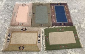 Five Wool Throw Rugs