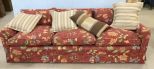 Red Upholstered Three Cushion Sofa