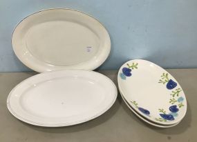 Four  Large Ceramic Platters