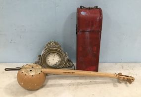 Modern Resin Mantle Clock, Red Painted Container, and Tribal Instrument