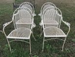 Four White Wrought Iron Patio Chairs