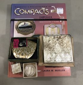 Group of Compacts and Book