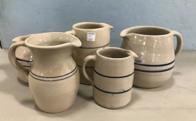 Five Blue Label Stoneware Pitchers