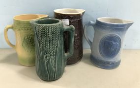 Four Glaze Stoneware Pitchers