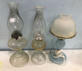 Two Glass Oil Lamps and Blue Glass Globe Lamp
