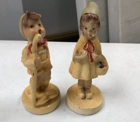 Antique Ceramic Boy and Girl Figurines