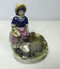 Staffordshire Style Figurine of a Lady With Sheep