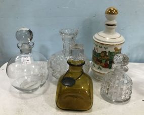 Group of Five Porcelain and Glass Decanters