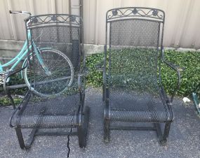 Two Wrought Iron Outdoor Arm Rocking Chairs