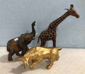 Leather Giraffe, Painted Gold Bull, and Wood Carved Elephant