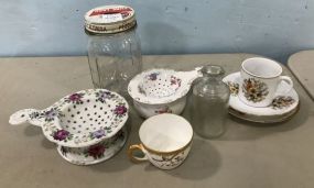 Porcelain Tea Strainers, Demi Tasse Cup Saucer, Glass Bottle and Jar.