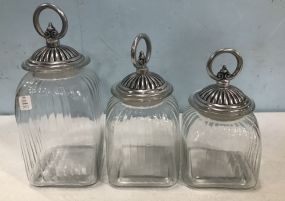 Three Decorative Glass Canisters