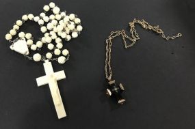 Decorative Carved Plastic Necklace and Marked 12kt Cross Necklace