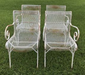 Four White Wrought Iron Arm Chairs