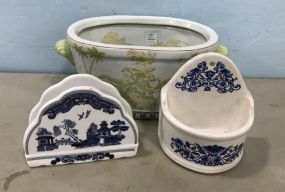 Decorative Oriental Fish Planter, Johnson Bros Blue and White Napkin Holder, and Merle Norman Wall Pocket