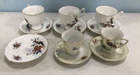 Six Porcelain Demi Tasse Cups and Saucers