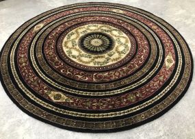 Hand Woven Black and Gold Circle Rug
