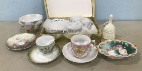 Porcelain Plates and Mustache Cups