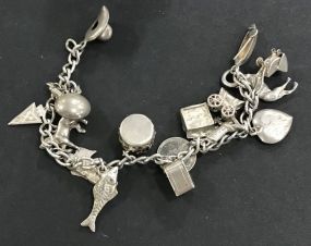 Vintage Sterling Silver Charm Bracelet with 17 Sterling Charms