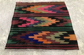 Low Pile Multi Colored Hand Woven Rug