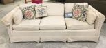 White Upholstered Three Cushion Sofa