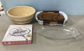 New Corning Ware Baking Dish, Crystal Sectional Plate, Labeled Stoneware Bowl, Pottery Tray, and Glass Fish Dish.